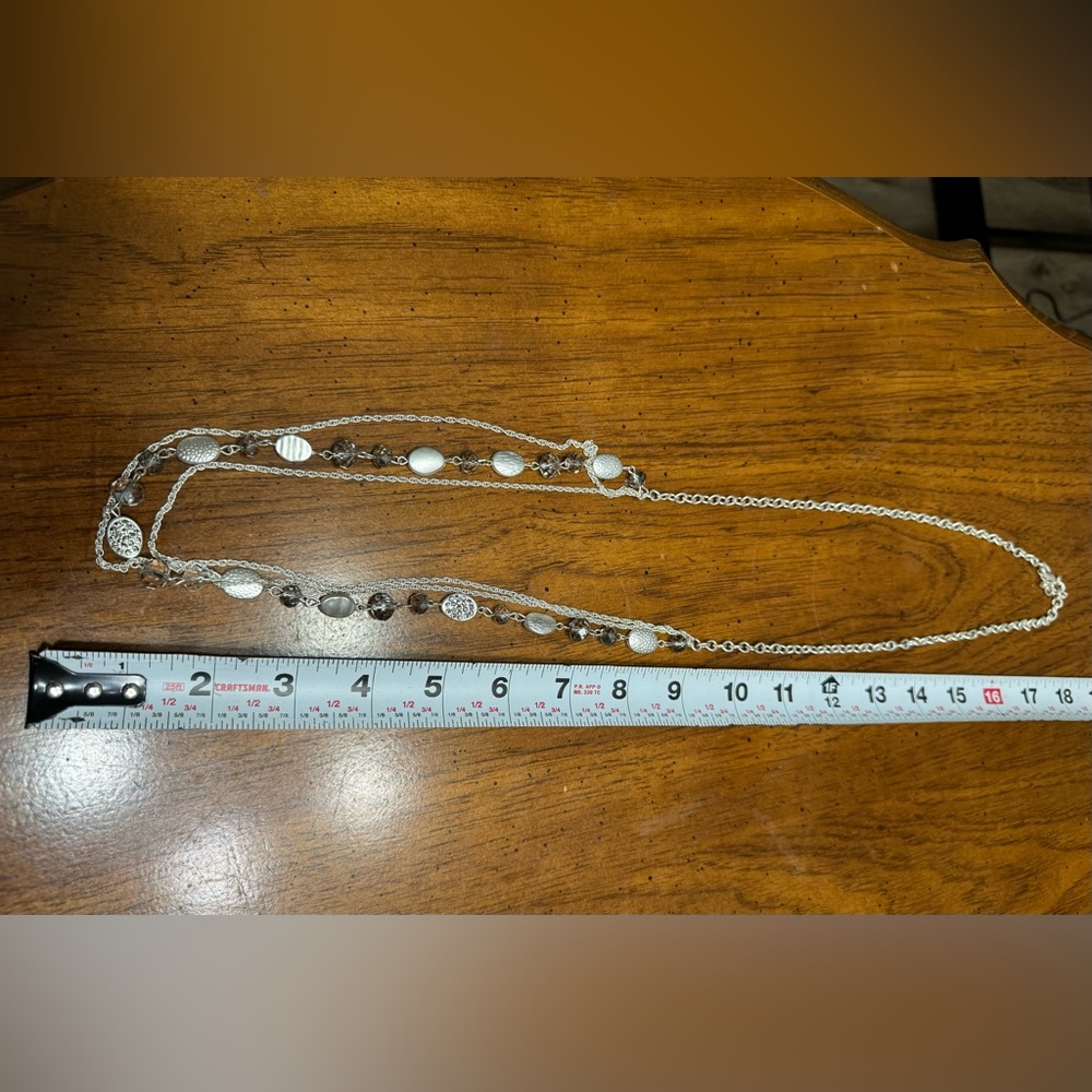 Women’s silver necklaces and earrings